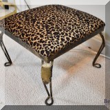 F09. Small metal footstool with leopard print upholstery. 9.5” h x 12”w x 12”d